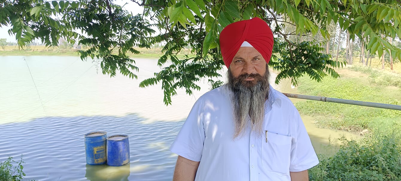 A fish farmer in India.
